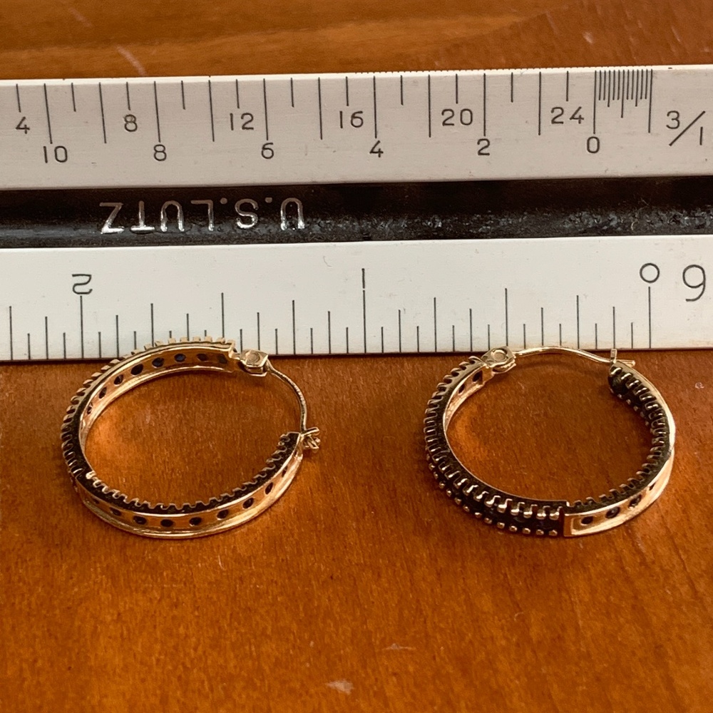 14kt gold hoops with blue sapphire stones